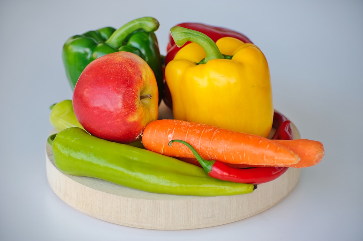 Mediterranean diet spread with olive oil, fresh vegetables, and fish